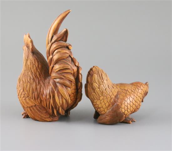 A Chinese boxwood figure of a cockerel and a similar of a hen, late 20th century, H.16cm and 8.5cm